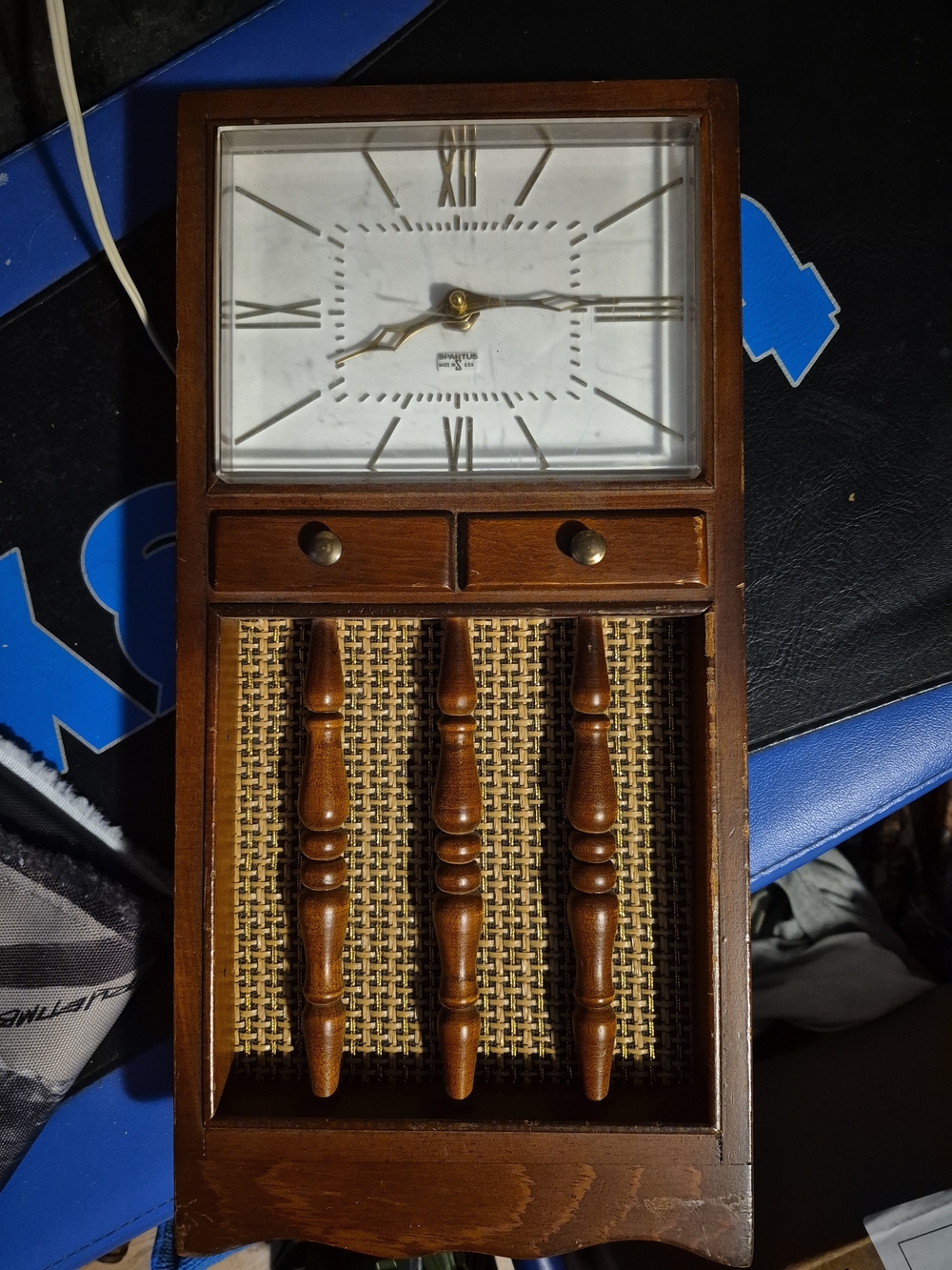 Wood-Finish Brown Wall Clock with Decorative Spindles by